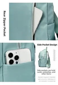 Détail du sac à dos en nylon vert menthe avec poche antivol au dos et rangement latéral utile