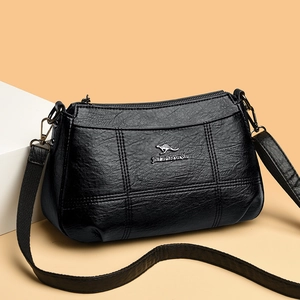 Sac fourre-tout minimaliste en cuir noir avec logo kangourou et bandoulière réglable