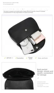 Internal multi-compartment view of soft black leather shoulder bag with large capacity