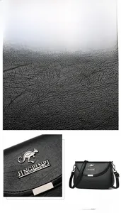 Detail of black crossbody bag with lychee texture leather and kangaroo metal logo