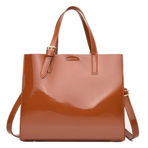 Caramel brown patent leather tote bag with woven texture and adjustable shoulder strap