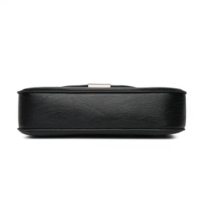 Bottom view of black textured leather crossbody bag with stitching and gold buckle