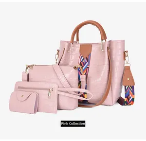 Detailed view of pink croc-pattern 4-piece handbag set with ethnic style shoulder strap