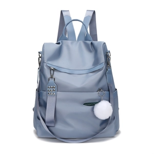 Fog blue Oxford cloth backpack for women with metal rivets and plush ball charm decoration