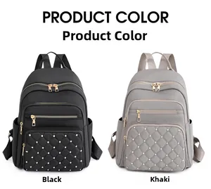Detail view of Oxford fabric backpacks in black and khaki with quilted patterns