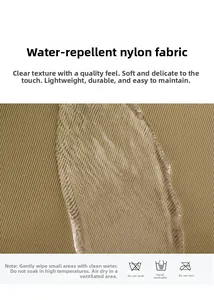 Macro detail of khaki water-repellent nylon fabric with water droplets and texture