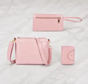 Pink crocodile pattern 3-piece set featuring shoulder bag, clutch, and card holder