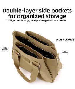 Detail view of khaki nylon bag with three compartment structure and sturdy fabric handles