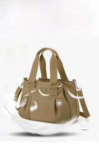 Detail of khaki nylon bag showing high-quality fabric texture and lightweight feather concept