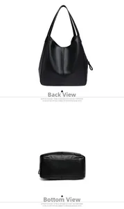 Detail view of the black lychee pattern leather tote bag showing back and bottom stitching