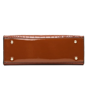 Bottom view of large brown crocodile embossed tote bag with gold protective studs