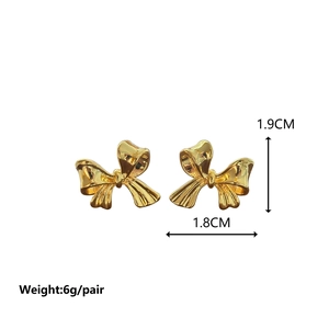 Polished gold bow stud earrings for women with minimalist metallic finish, 1.9cm size