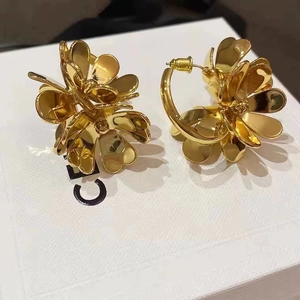 French vintage gold floral earrings with multi-layered petals and polished finish
