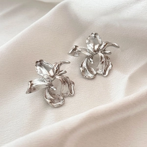 French vintage irregular silver flower earrings with textured metallic petals on silk