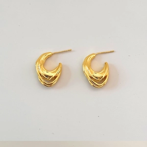 Polished gold-tone twisted C-shape hoop earrings with a minimalist flowing design