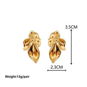 Exaggerated golden leaf-shaped earrings with irregular lava texture for women