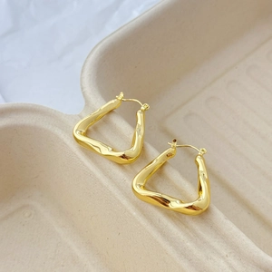 Chic twisted hollow geometric triangle gold hoop earrings with high-polish metallic finish