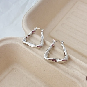 Minimalist silver irregular hollow triangle hoop earrings with a mirror-polished finish