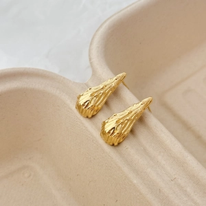 Minimalist 18K gold water drop earrings with irregular organic texture and taper shape