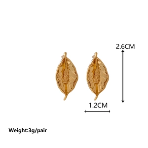 Minimalist gold leaf stud earrings with detailed leaf vein textures and size dimensions