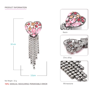 Boucles d'oreilles cœur rose à pampilles avec strass et finition alliage