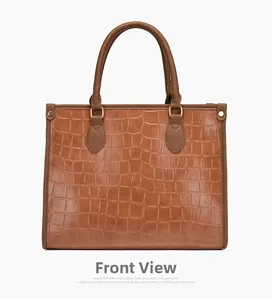 Front view of a brown tote bag featuring crocodile embossed texture and golden hardware