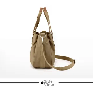 Side view of khaki nylon tote bag featuring adjustable shoulder strap and metal D-rings
