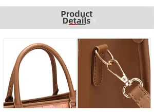 Detail of brown embossed leather tote showing round handle and gold metal strap buckles