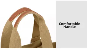 Detail of the comfortable handle with uniform stitching on khaki canvas fabric