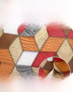 Dettaglio della borsa patchwork multicolore con trama animale e cuciture di precisione