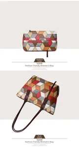 Vista dettagliata della borsa tote con patchwork 3D e trama in rilievo a coccodrillo