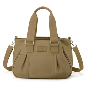 Khaki nylon large capacity tote bag with orange handle interior and adjustable strap