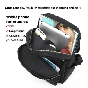 Detailed interior view of a high-capacity waterproof oxford cloth backpack with compartments