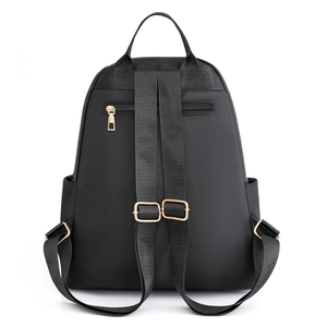 Fashionable black oxford fabric backpack for women with gold zippers and anti-theft back pocket