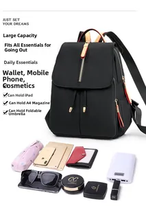 Detail view of high capacity black nylon backpack interior showing storage for iPad and A4 magazines