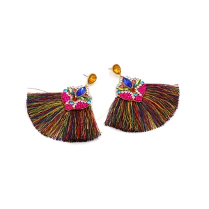 Detail showing bohemian fan-shaped tassel earrings with colorful silk threads and crystals
