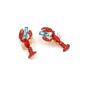 Golden lobster drop earrings with red rhinestones and blue crystals for women