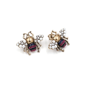 Vintage gold bee stud earrings with inlaid pearls and blue enamel rhinestones