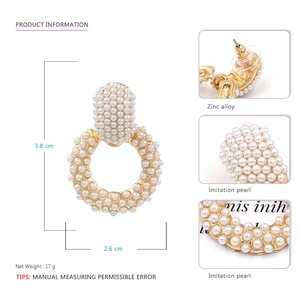 Baroque pearl hoop earrings in gold finish with dimensional details and measurements