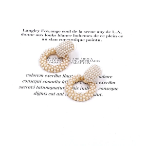 Baroque pearl hoop earrings with gold-toned metal base and elegant round studs