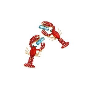 Fashion lobster earrings featuring red rhinestones and blue crystal accents on gold plating
