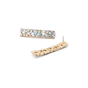 Macro detail of geometric AB crystal earrings with gold base showing front and back view