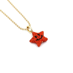 Long gold beaded sweater chain with double-sided sparkling red star pendant and smile face