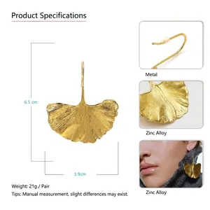 Artistic gold ginkgo leaf dangle earrings in zinc alloy with detailed vein textures