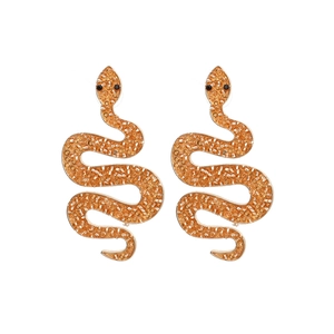 Retro golden snake-shaped earrings with amber beads inlay on a clean white background