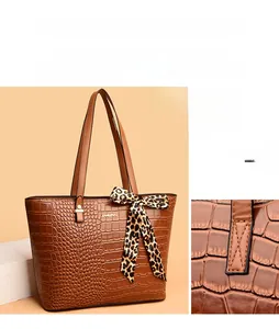 Brown crocodile pattern tote bag with leopard bow scarf and protective bottom base studs