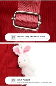 Detail of red corduroy backpack showing adjustable metal buckle and plush bunny charm