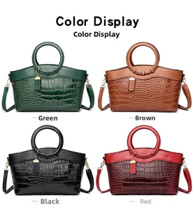 Vue détaillée de sacs à main à texture crocodile en quatre couleurs avec anses rondes