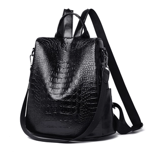 Women's black crocodile pattern PU leather backpack with adjustable straps and top handle