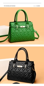 Detail of quilted PU leather handbags in forest green and black with golden twist locks